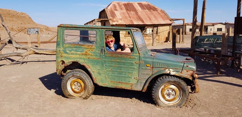 Rusting jeeps at Humberstone abandoned town in the atacama desert