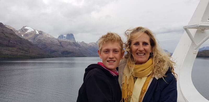 Hanging glaciers and towering rocks in patagonian fjords in chile